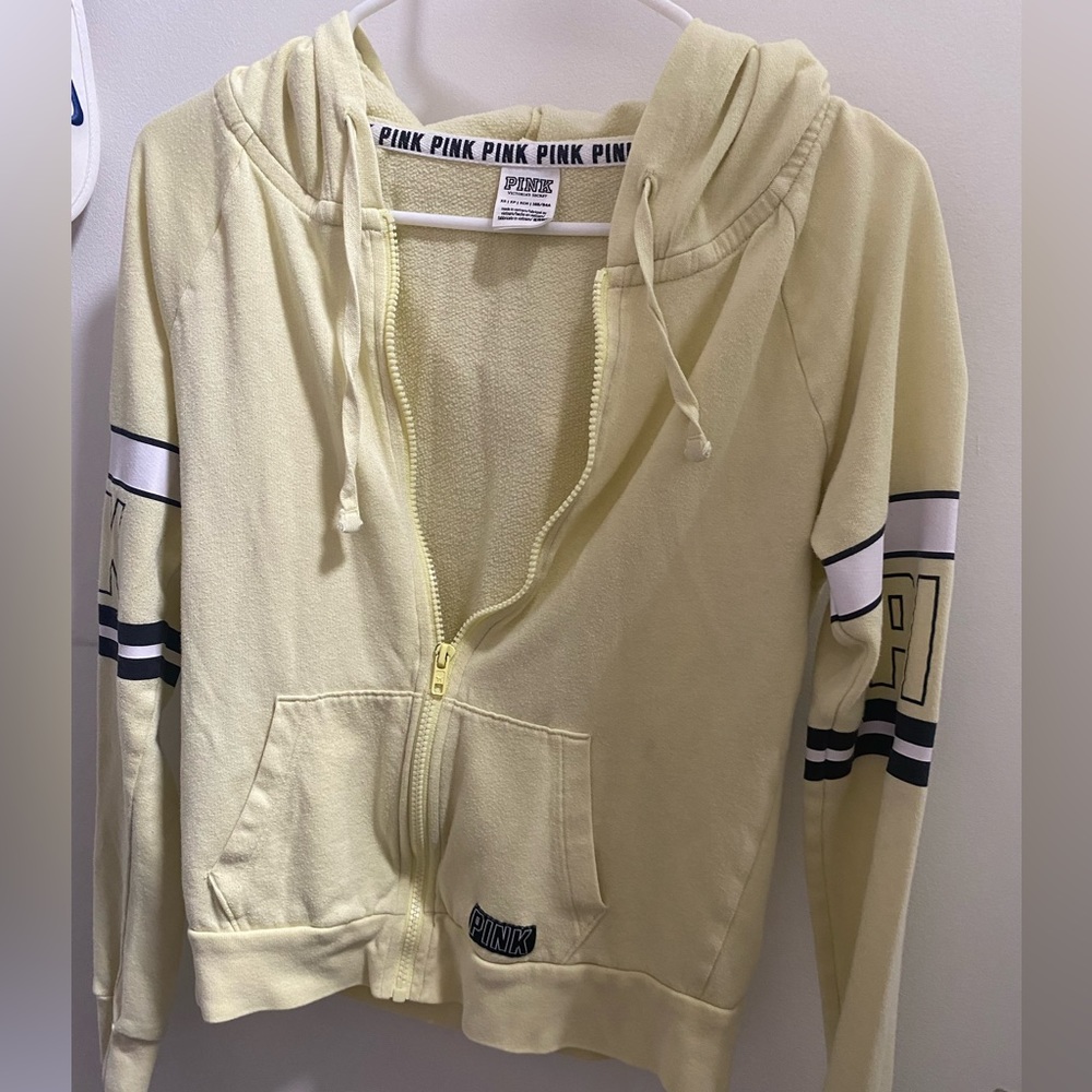 Zip up hoodie.